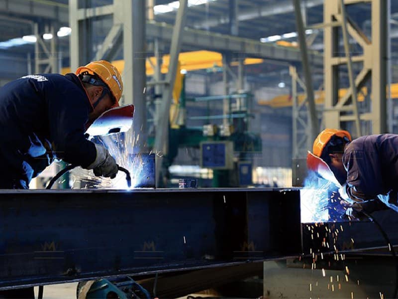 Welding Operations in Steel Structure Workshop